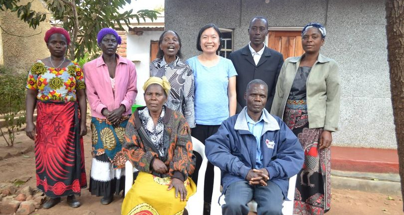 Thuy Bui (third from right in back), School of Medicine faculty member, helps lead the diabetes and hypertension peer support group at the Kamuzu Central Hospital in Lilongwe, Malawi.