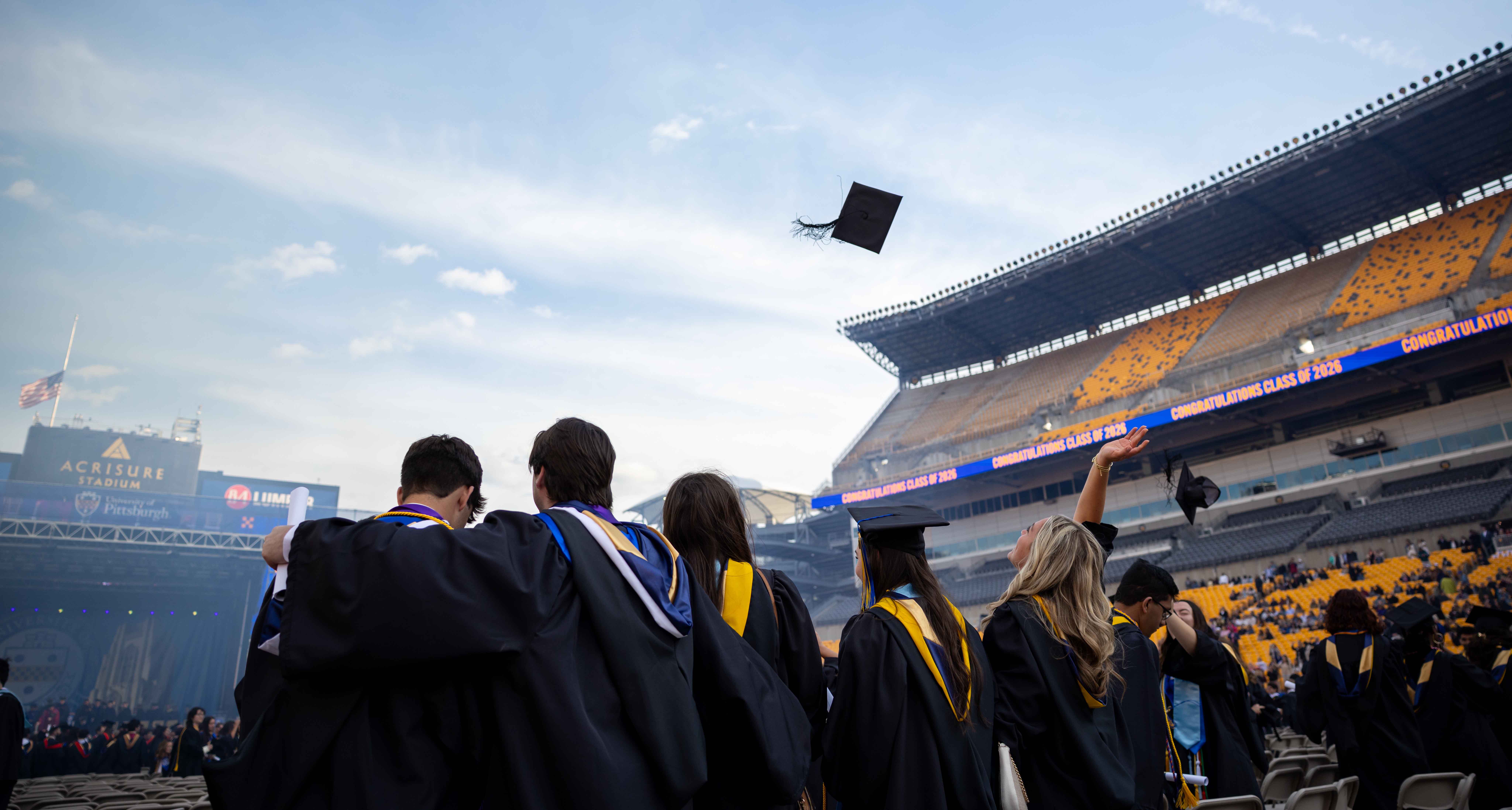 Pitt's spring commencement for undergraduates was held on May 3 at Acrisure Stadium, to accommodate more guests. (Alex Mowrey | University of Pittsburgh) Mortarboard thrown in the air