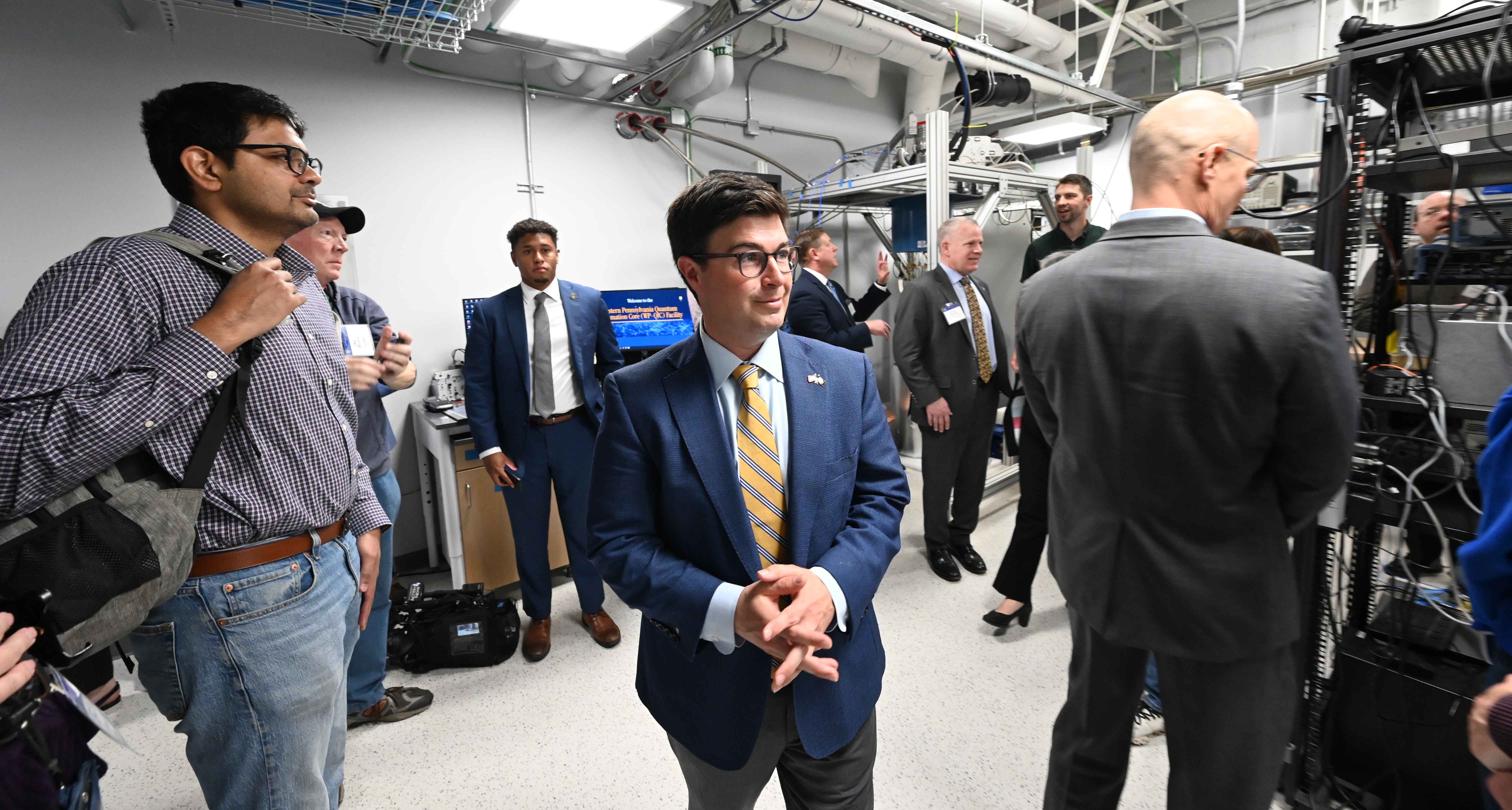 Mayor Corey O'Connor surrounded by other people