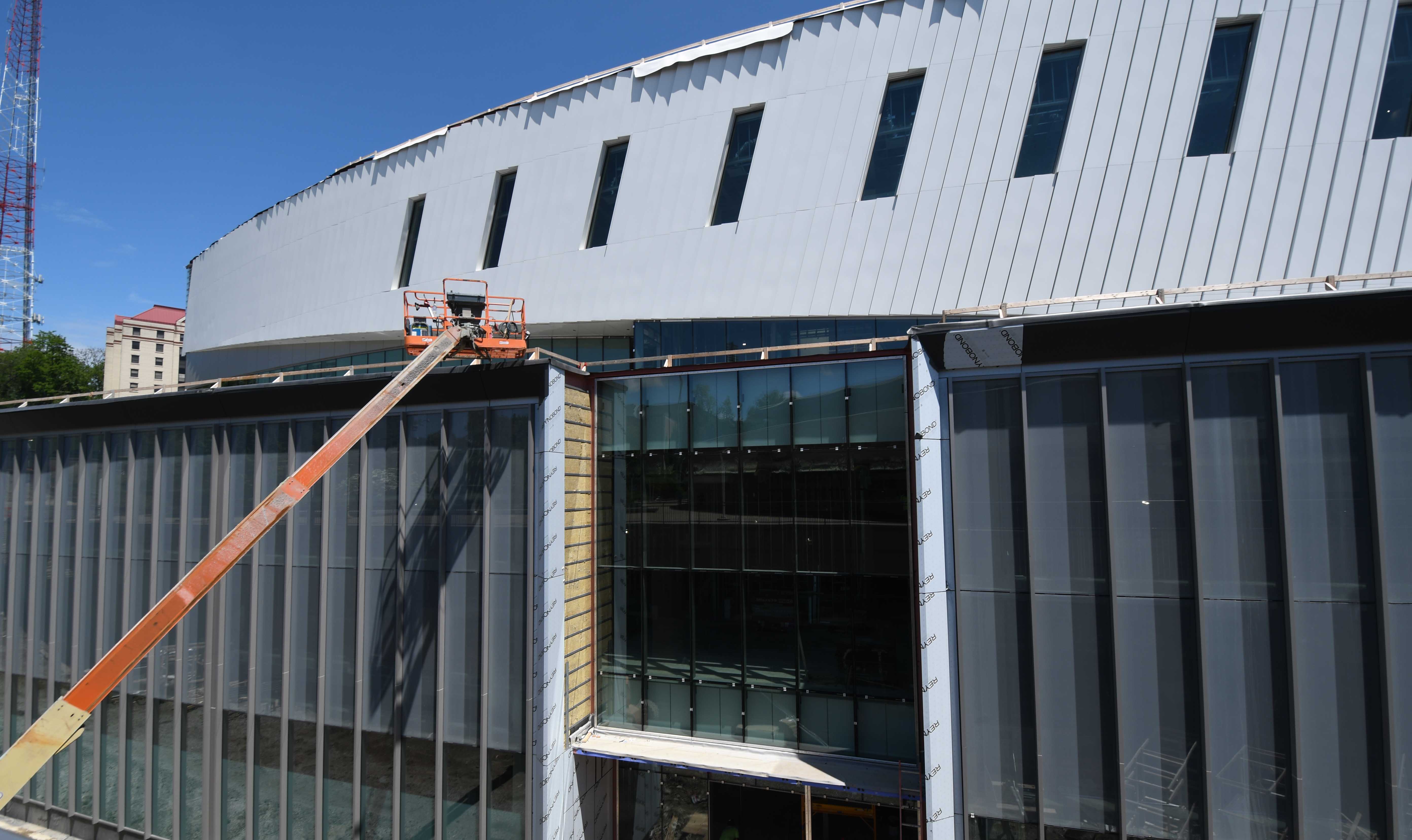 Work is continuing on the exterior finishes of the Arena and Sports Performance Center next to the Petersen Events Center.