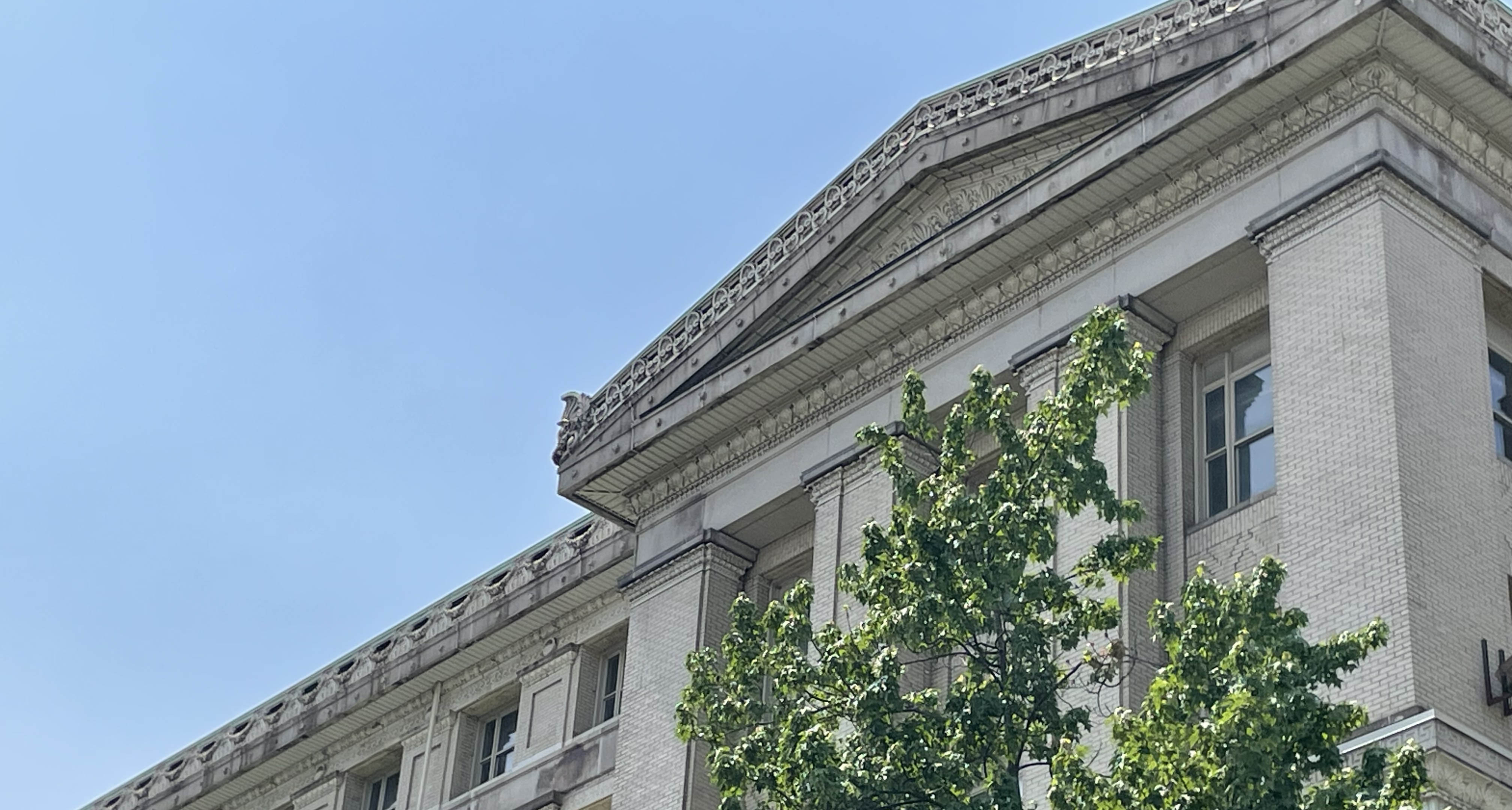 The preservation work on the Thaw Hall roof and cornices has expanded to include the entire facade.