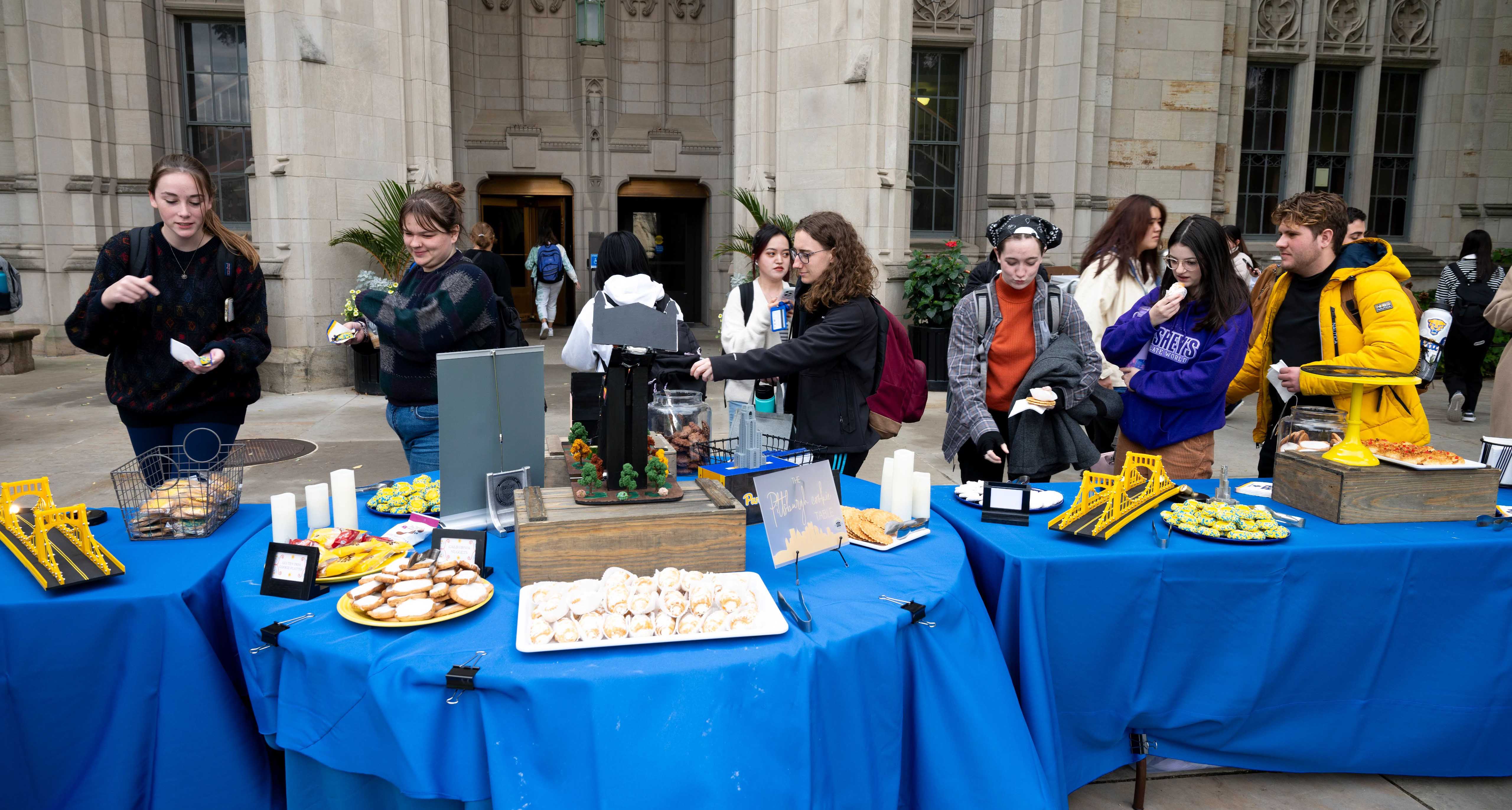 Chancellor Joan Gabel hosted a pop-up cookie table outside the Cathedral of Learning on Oct. 10. (Tom Altany | University of Pittsburgh) Cookie table near Cathedral of Learning