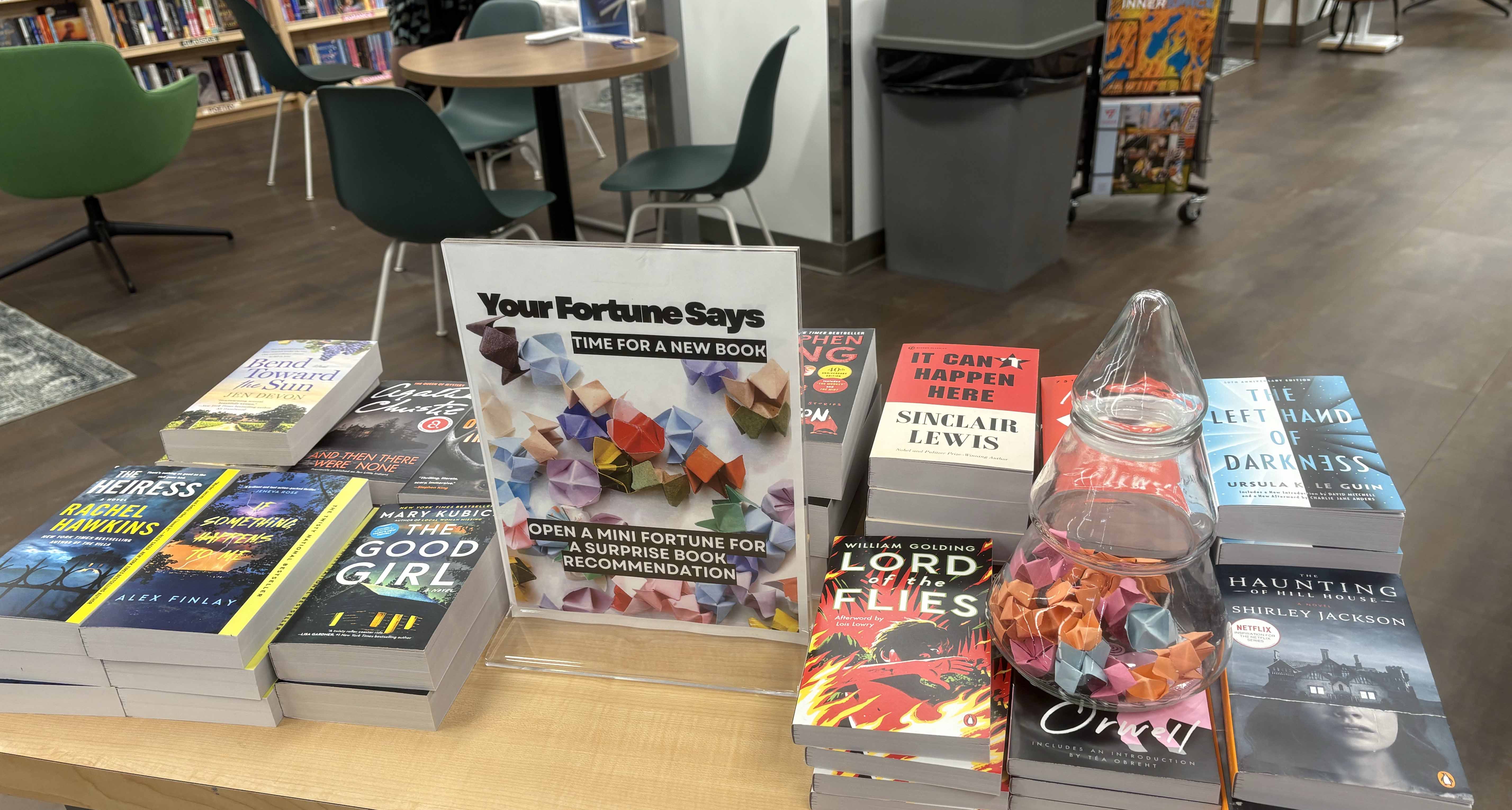 The Panther Den space on the ground of the University Store on Fifth also features a book store with popular fiction and nonfiction works, along with book-related gifts. (Susan Jones | University Times) Books on a table